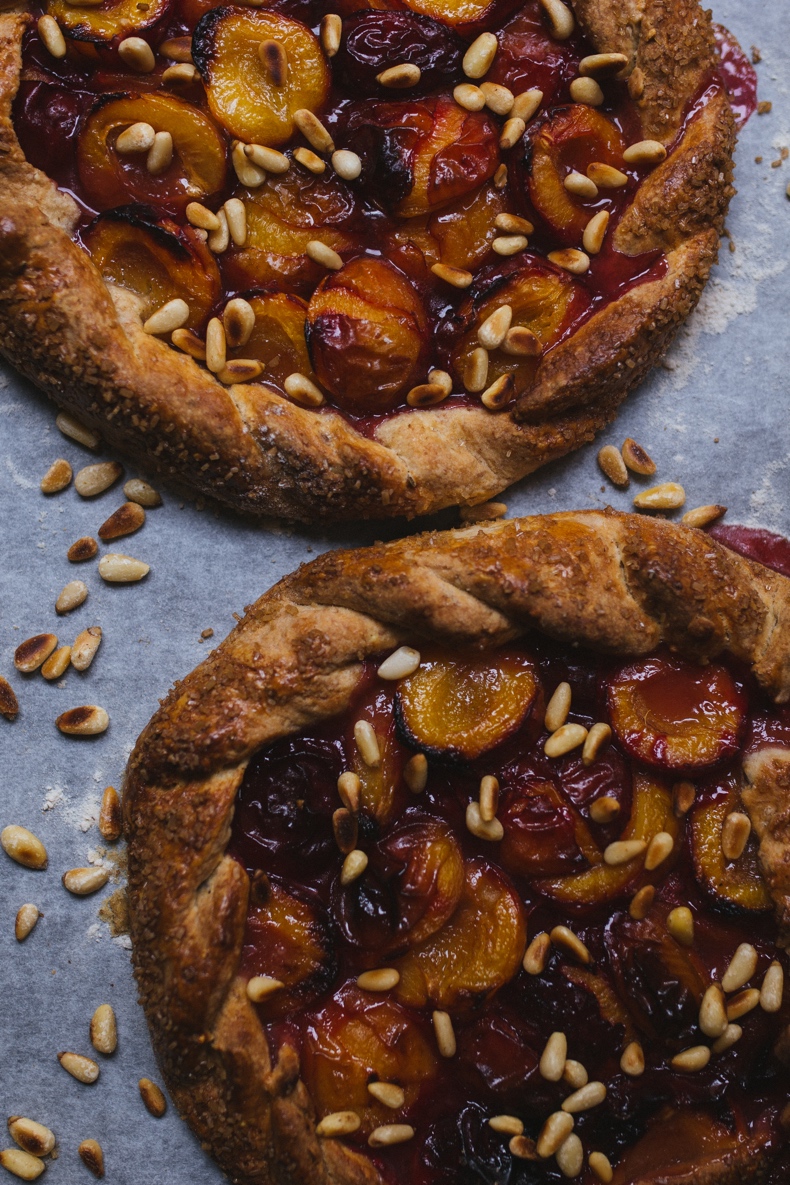 Wholewheat Plum Galette with Pine Nuts by Tanya Balyanitsa (more recipes on Honeytanie.com)