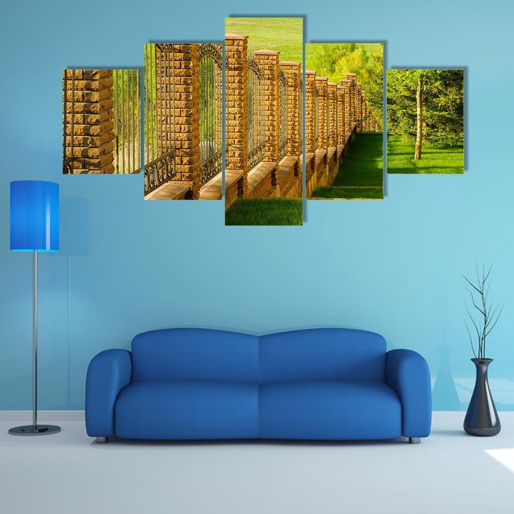 Forged Fence With Stone Pillars On Green Slope - Nature 5 Panel Canvas Art Wall Decor Forged Fence With Stone Pillars On Green Slope - Nature 5 Panel Canvas Art Wall Decor